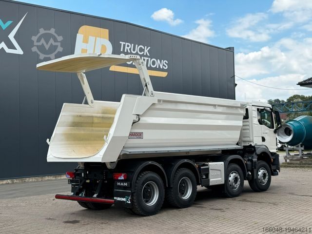 Tipper truck MAN TGS 41.480 BB 8X4 Hydraulische Klappe