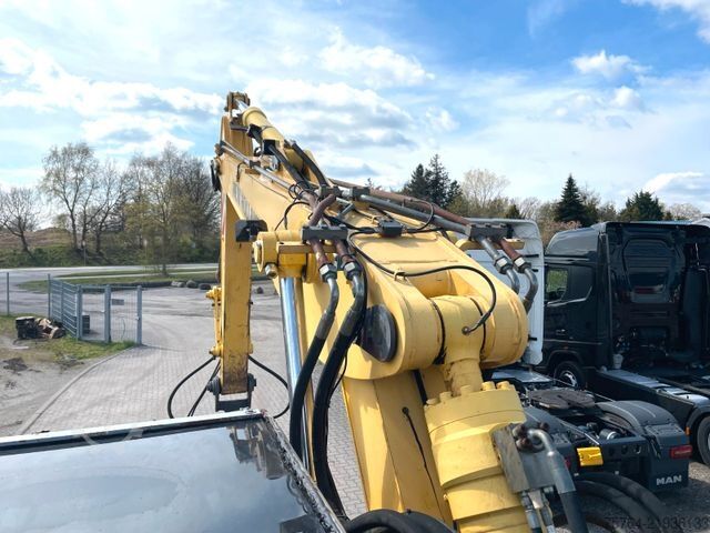 Mobile excavator NEW HOLLAND MH Plus / Verstellausleger / 3 Stück!