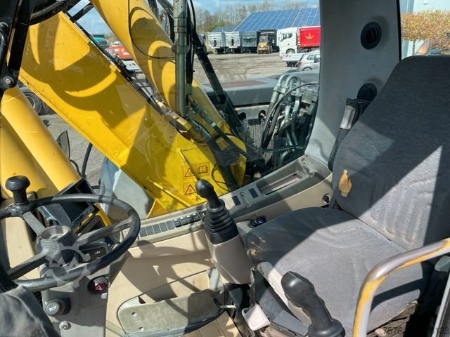Mobile excavator NEW HOLLAND MH Plus / Verstellausleger / 3 Stück!