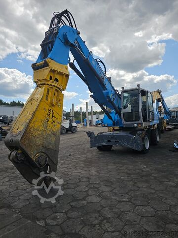 Material handler Fuchs MHL 340 FQC + Genesis GXP300R