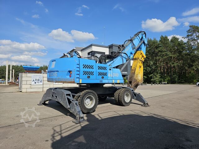 Material handler Fuchs MHL 340 FQC + Genesis GXP300R