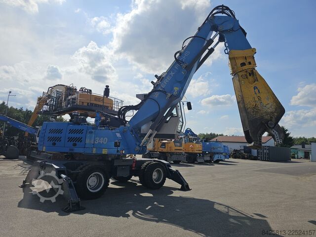 Material handler Fuchs MHL 340 FQC + Genesis GXP300R