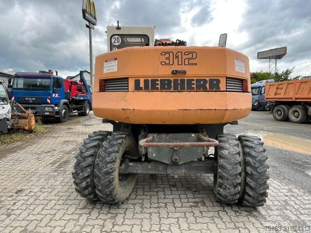Mobile excavator LIEBHERR A 312 Bagger Deutsch Top