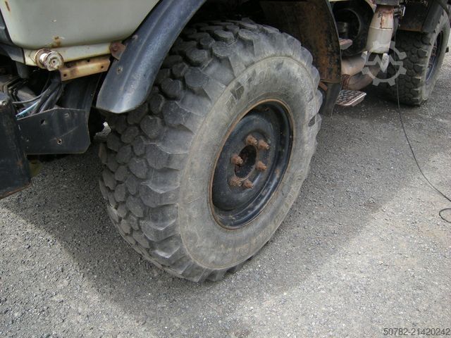Dreiseitenkipper UNIMOG Unimog U1250 mit Kran