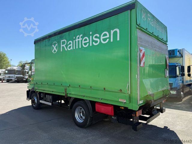 Flatbed truck with tarp IVECO EuroCargo 160 E 28 Pritsche 5,40 m LBW 1,5 T*AHK