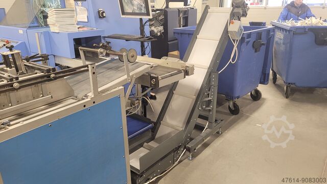 Waste conveyor for a three-knife trimmer United Bindery Waste conveyor for a three-knife trimmer