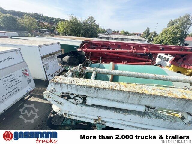 Mobile concrete mixing plant MAN 33.292 8x4 Mischer Stetter 7m³ mit Pumpe Schwing