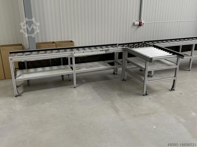 Assembly line with roller conveyor made from aluminum system profile and INTERROLL metal rollers, co MiniTec - wie BOSCH REXROTH 13240 x 405