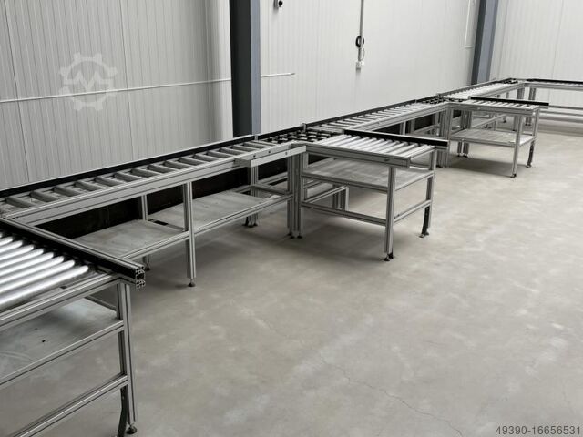 Assembly line with roller conveyor made from aluminum system profile and INTERROLL metal rollers, co MiniTec - wie BOSCH REXROTH 13240 x 405