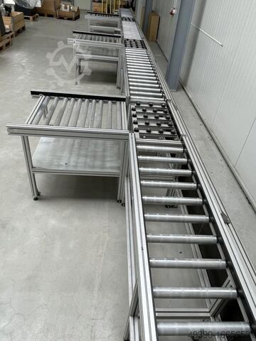 Assembly line with roller conveyor made from aluminum system profile and INTERROLL metal rollers, co MiniTec - wie BOSCH REXROTH 13240 x 405