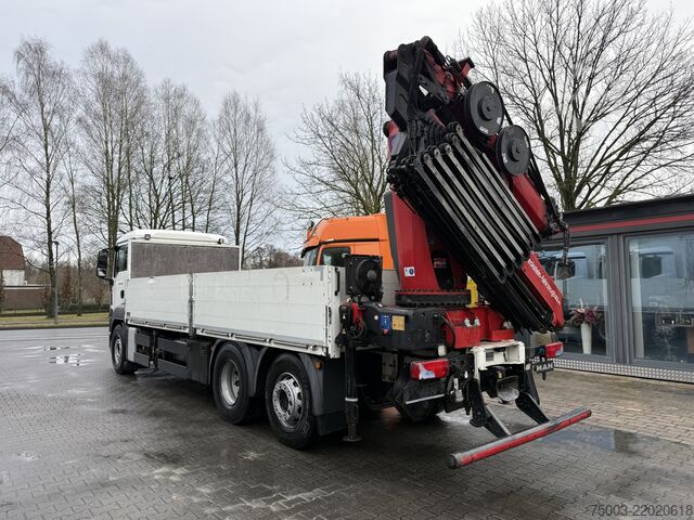 Flatbed truck MAN TGS 26.440 6X2-4 Kran HMF 3220 bis 29 Meter