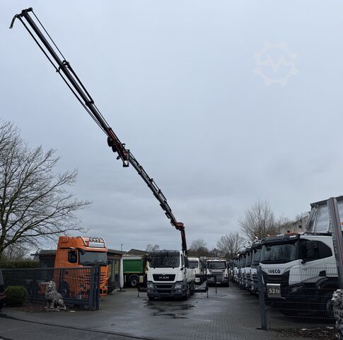 Flatbed truck MAN TGS 26.440 6X2-4 Kran HMF 3220 bis 29 Meter