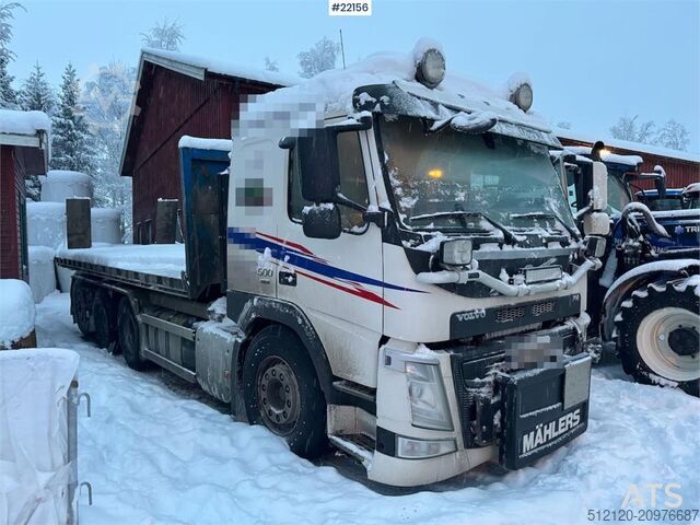 Hook arm system Volvo FM500 snow plough equipped tridem hook truck