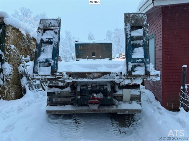 Hook arm system Volvo FM500 snow plough equipped tridem hook truck