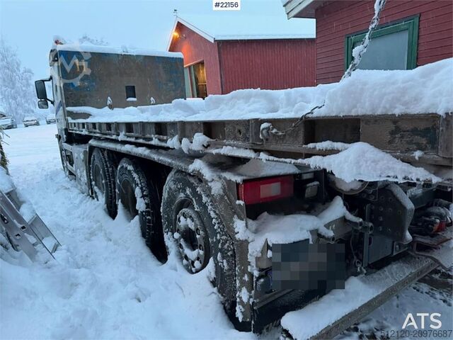 Hook arm system Volvo FM500 snow plough equipped tridem hook truck