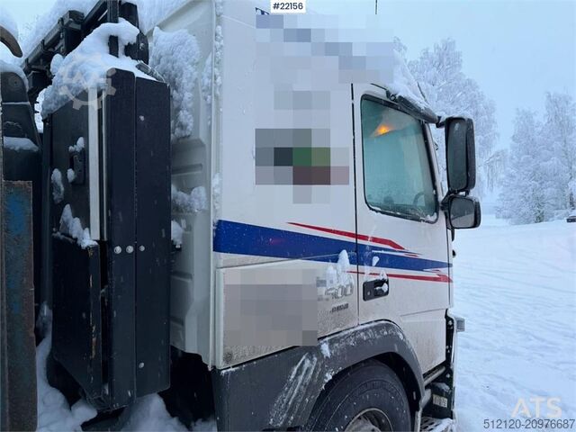 Hook arm system Volvo FM500 snow plough equipped tridem hook truck