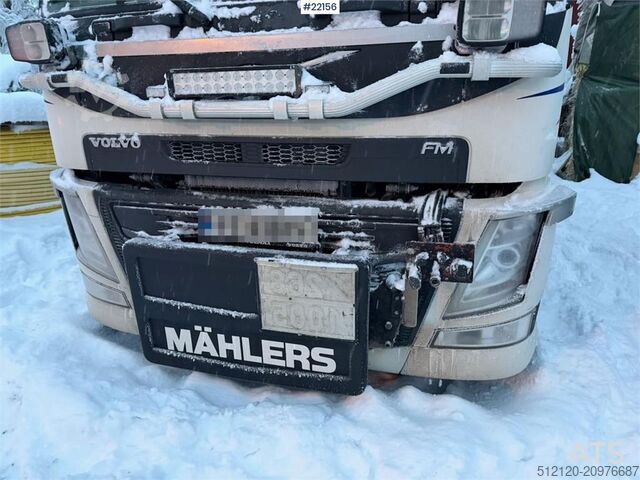 Hook arm system Volvo FM500 snow plough equipped tridem hook truck