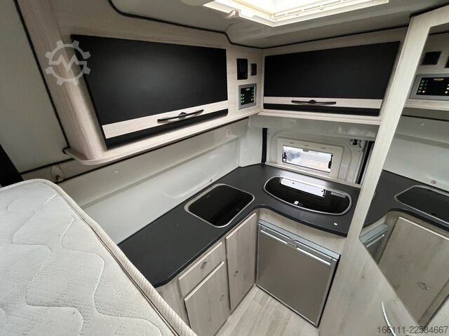 Kastenwagen Wohnmobil / Campervan KARMANN Dexter 550 - Hubbett - Heckbad - Klima -