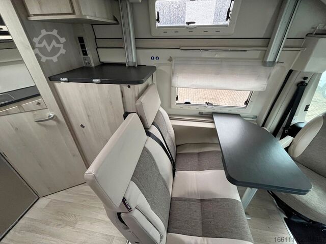 Kastenwagen Wohnmobil / Campervan KARMANN Dexter 550 - Hubbett - Heckbad - Klima -