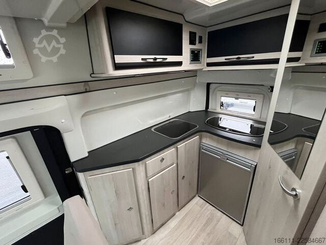 Kastenwagen Wohnmobil / Campervan KARMANN Dexter 550 - Hubbett - Heckbad - Klima -