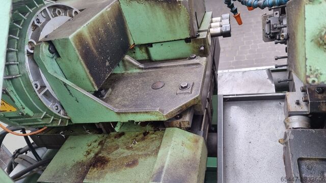 MANURHIN TRAMINER 20 CNC automatic lathe Manurhin TRA 20