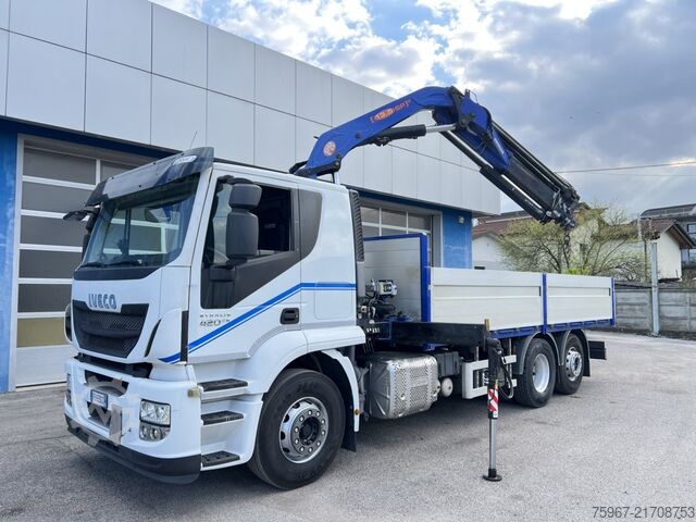 Truck with fixed flatbed and crane Iveco Stralis 420