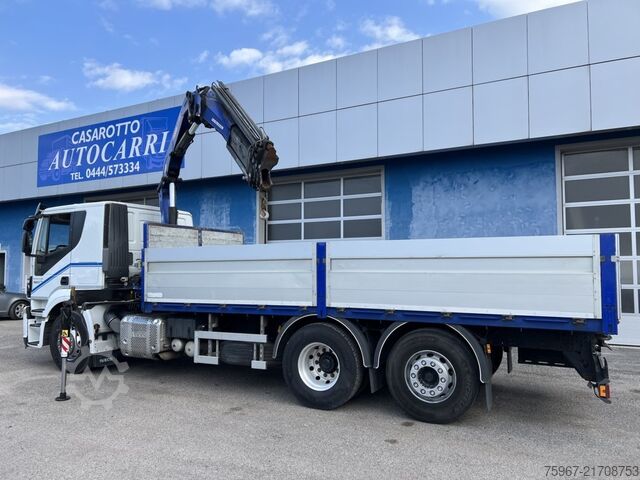 Truck with fixed flatbed and crane Iveco Stralis 420