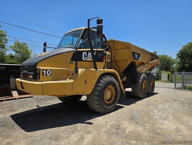 Articulated dump truck CATERPILLAR 730