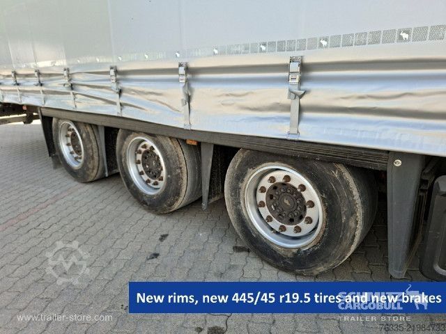 Open semitrailer with tarp Schmitz Cargobull Curtainsider Mega