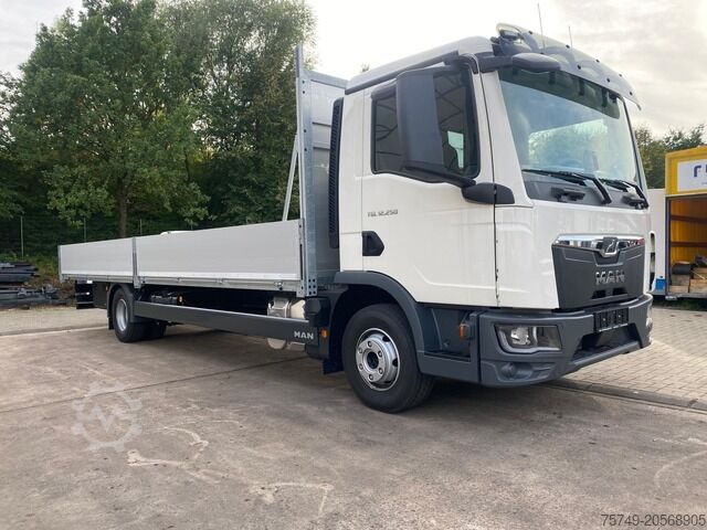 Flatbed truck man 12.250 BL Gerüstbaupritsche 2x AHK