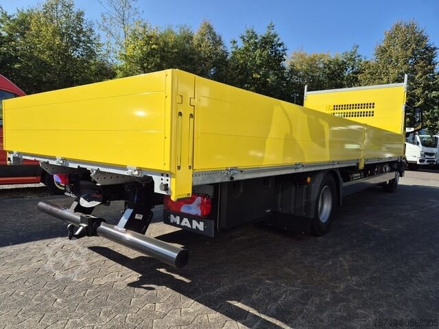 Flatbed truck man 12.250 BL Gerüstbaupritsche 2x AHK