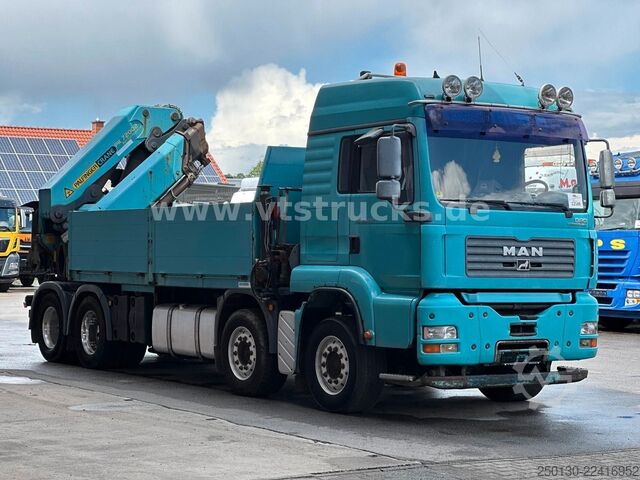 Flatbed truck MAN TGA 35.430 8x4 BL Baustoff PALFINGER 72002 LK