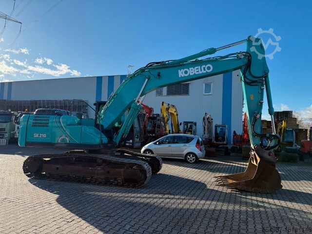 Chain excavator KOBELCO SK210 NLC-10 OQ70 Klimaautomatik 180 Grad