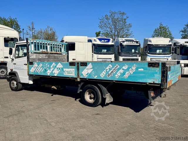 Loading platform Mercedes-Benz 711 D open truck. 5.10 m long cargo, 3 seats. V...