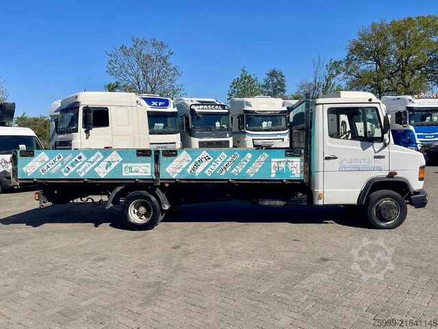 Loading platform Mercedes-Benz 711 D open truck. 5.10 m long cargo, 3 seats. V...