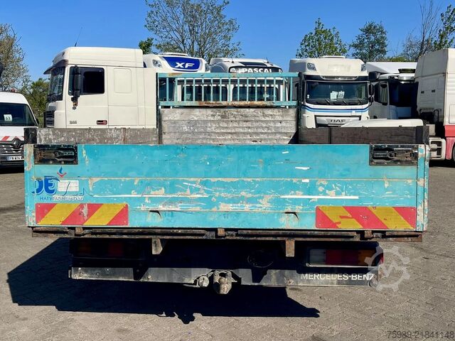 Loading platform Mercedes-Benz 711 D open truck. 5.10 m long cargo, 3 seats. V...