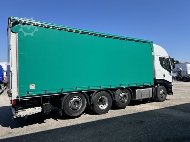 Flatbed truck with tarp Iveco Stralis 480