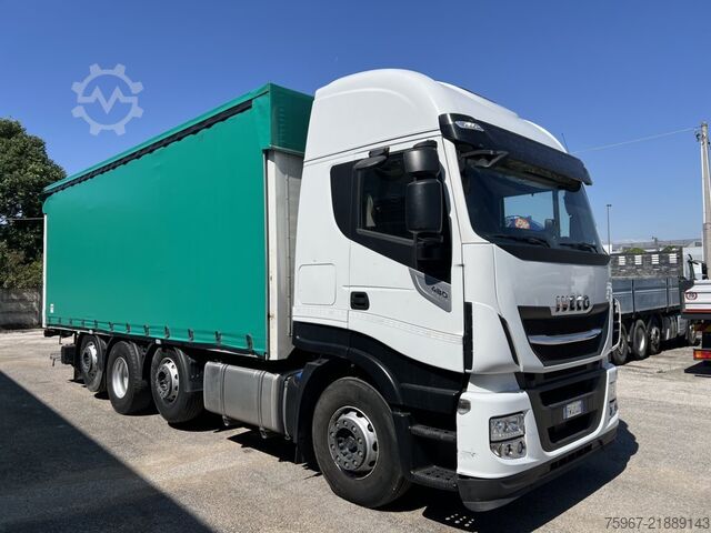 Flatbed truck with tarp Iveco Stralis 480