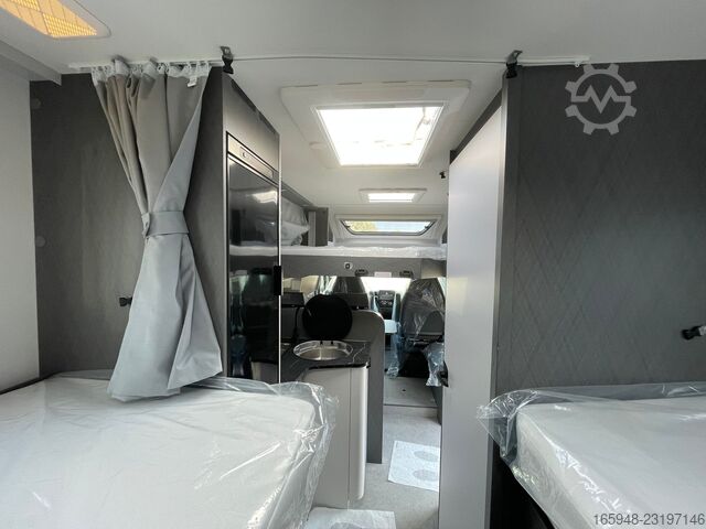 Teilintegriertes Wohnmobil ETRUSCO 6900 SB T | Automatik,NAVI+RFK-4. Personen!
