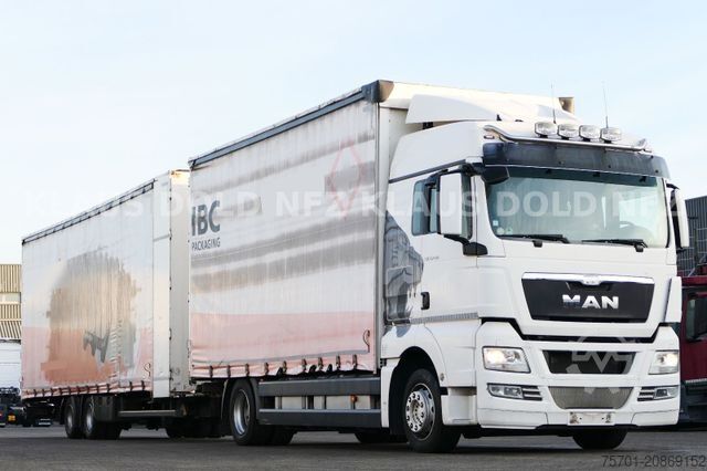 Flatbed truck with tarp MAN TGX 18.400 Retarder Komplettzug mit Anhänger