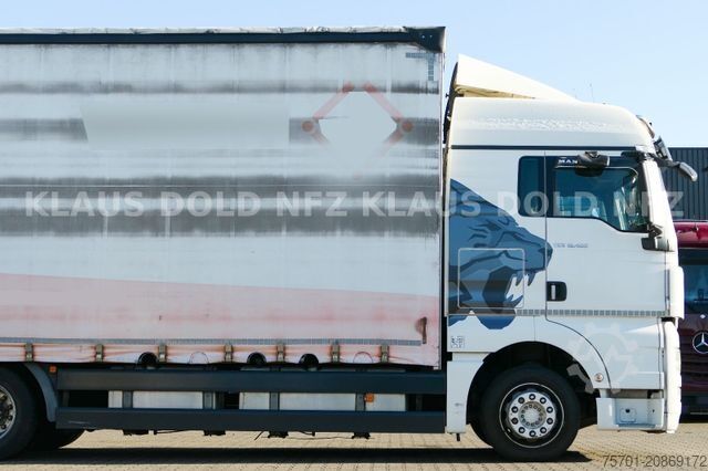 Flatbed truck with tarp MAN TGX 18.400 Pritsche Plane Retarder 2-Tanks