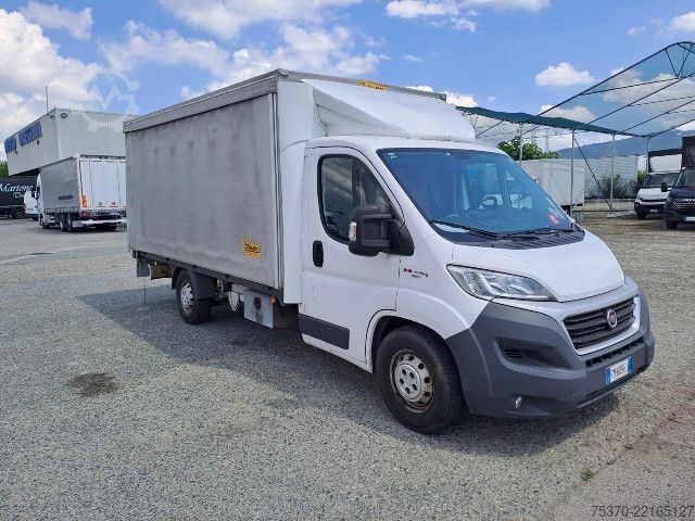 Transporter mit Pritsche & Plane Fiat DUCATO - ALZA/ABBASSA
