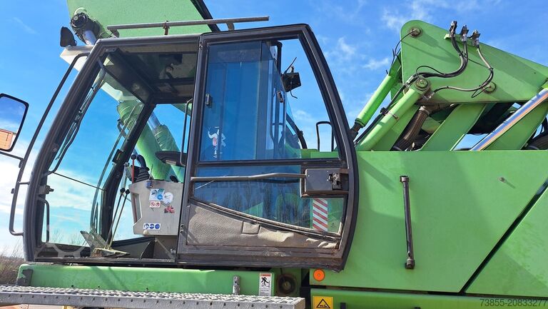 Umschlagbagger Sennebogen 850R with hydraulic rotating grapple