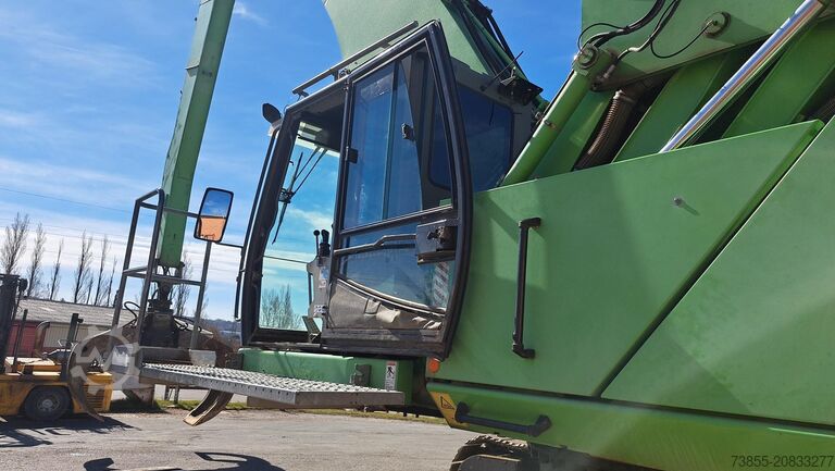 Umschlagbagger Sennebogen 850R with hydraulic rotating grapple