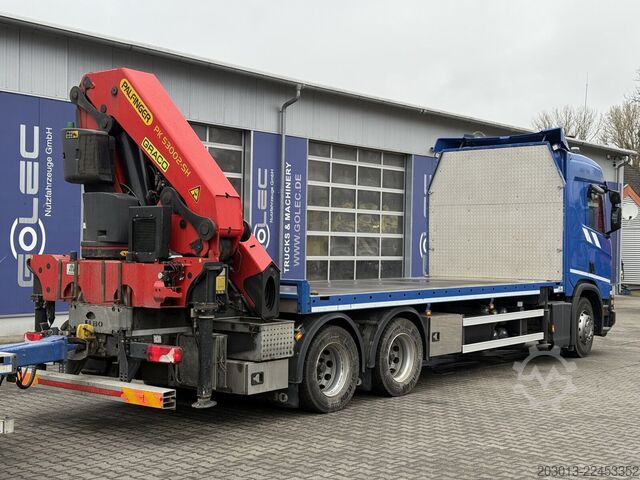 Flatbed truck SCANIA R500 6x4 Pritsche mit Kran Palfinger PK53002 SH