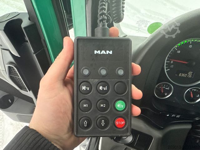 Roll-off tipper truck MAN TGX 26.440 Abrollkipper HYVA 20.60.S