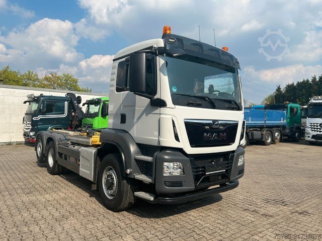 Roll-off tipper truck MAN 26.420 TGS Abroller Hydrodr. 6x4 3,90m Radstand