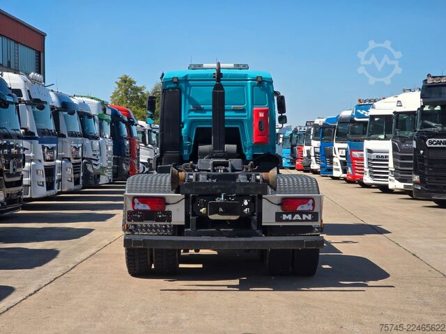 Roll-off tipper truck MAN TGA 26.440 * ABROLLKIPPER * BLATT * KLIMA *