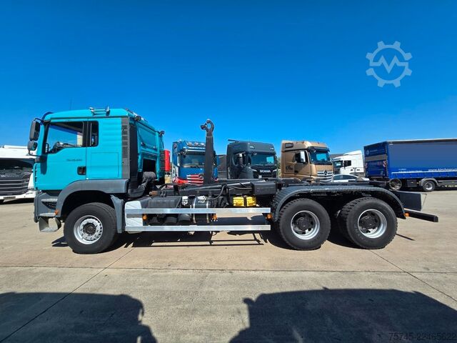 Roll-off tipper truck MAN TGA 26.440 * ABROLLKIPPER * BLATT * KLIMA *
