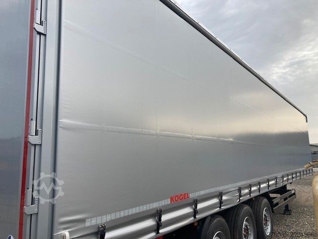 Open semitrailer with tarp KÖGEL SN24 NEU+Lift+SAF+EN12642XL+Hubdach+sofort